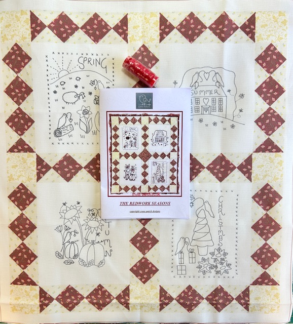 Redwork seasons Stitchery panel with pattern and thread